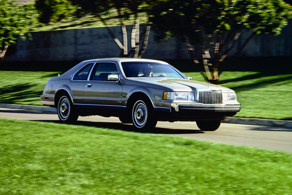 This archival image documents the 1985 Lincoln Continental Mark VII four-door and is preserved in the Ford Heritage Vault as part of Ford Motor Company's historic photographic archive. Free for personal, non-commercial use. Ford Heritage Vault ref...