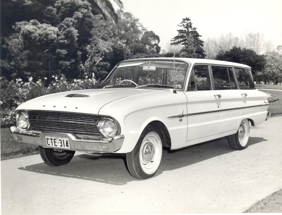 This archival image documents the 1962 Ford XL Falcon Station Wagon in scenic driveway with flowers and is preserved in the Ford Heritage Vault as part of Ford Motor Company's historic photographic archive. Free for personal, non-commercial use. F...