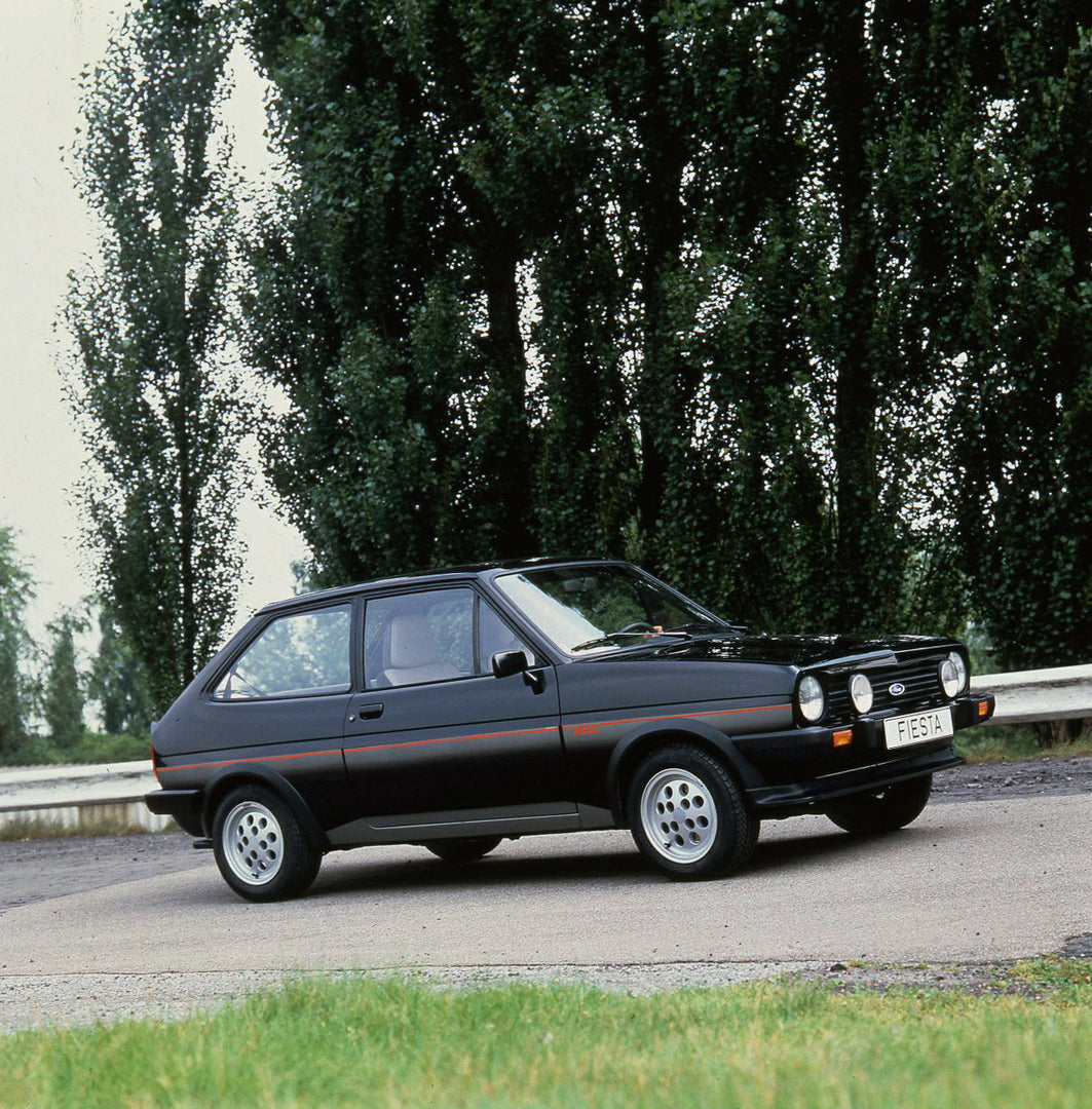 This archival image documents the 1981 Ford Fiesta XR2 LHD Mark I on scenic road and is preserved in the Ford Heritage Vault as part of Ford Motor Company's historic photographic archive. Free for personal, non-commercial use. Ford Heritage Vault ...