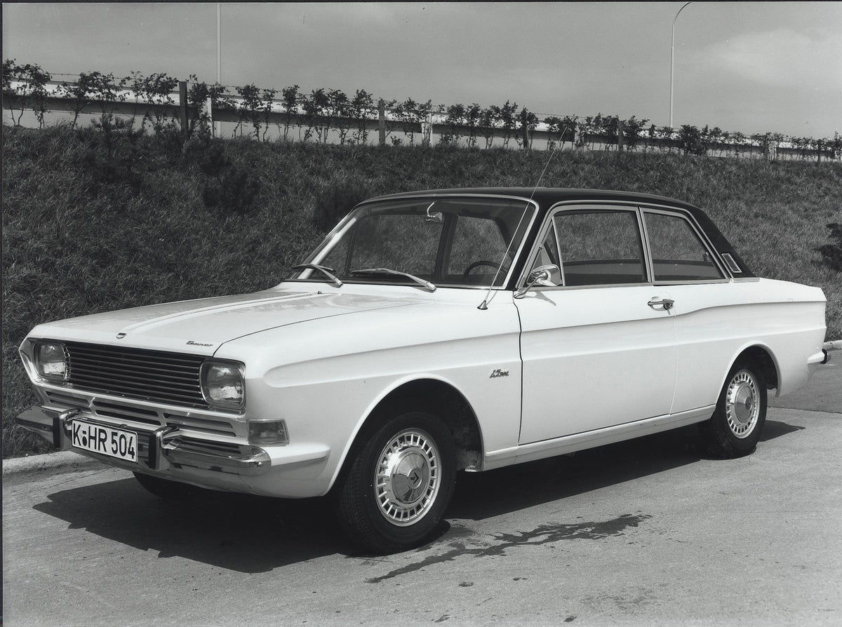 This archival image documents the 1966 Ford Taunus 15M P6 on scenic road and is preserved in the Ford Heritage Vault as part of Ford Motor Company's historic photographic archive. Free for personal, non-commercial use. Ford Heritage Vault referenc...