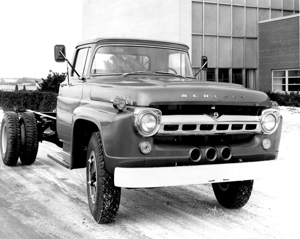 This archival image documents the 1957 Mercury M-700 truck on snowy road in front of building AR-2007-5 and is preserved in the Ford Heritage Vault as part of Ford Motor Company's historic photographic archive. Free for personal, non-commercial us...