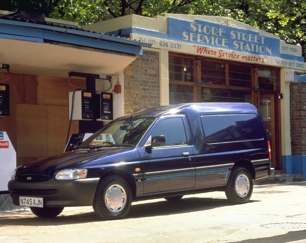 This archival image documents the 1995 Ford Escort Mark VI Van at gas station AR-2002-213709 and is preserved in the Ford Heritage Vault as part of Ford Motor Company's historic photographic archive. Free for personal, non-commercial use. Ford Her...