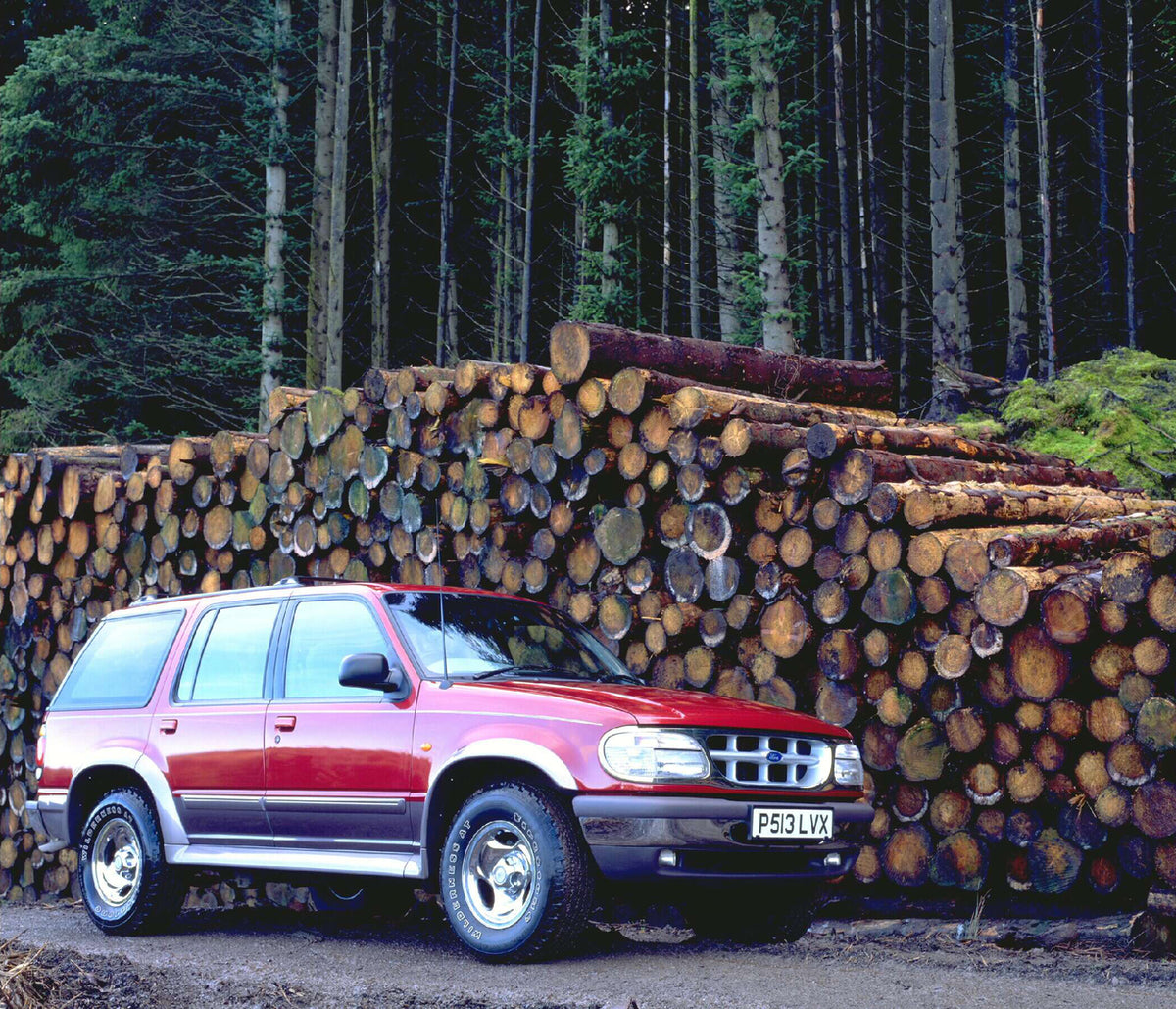 This archival image documents the 1996 Ford Explorer RHD low view in scenic forest with logs AR-2002-213709 and is preserved in the Ford Heritage Vault as part of Ford Motor Company's historic photographic archive. Free for personal, non-commercia...
