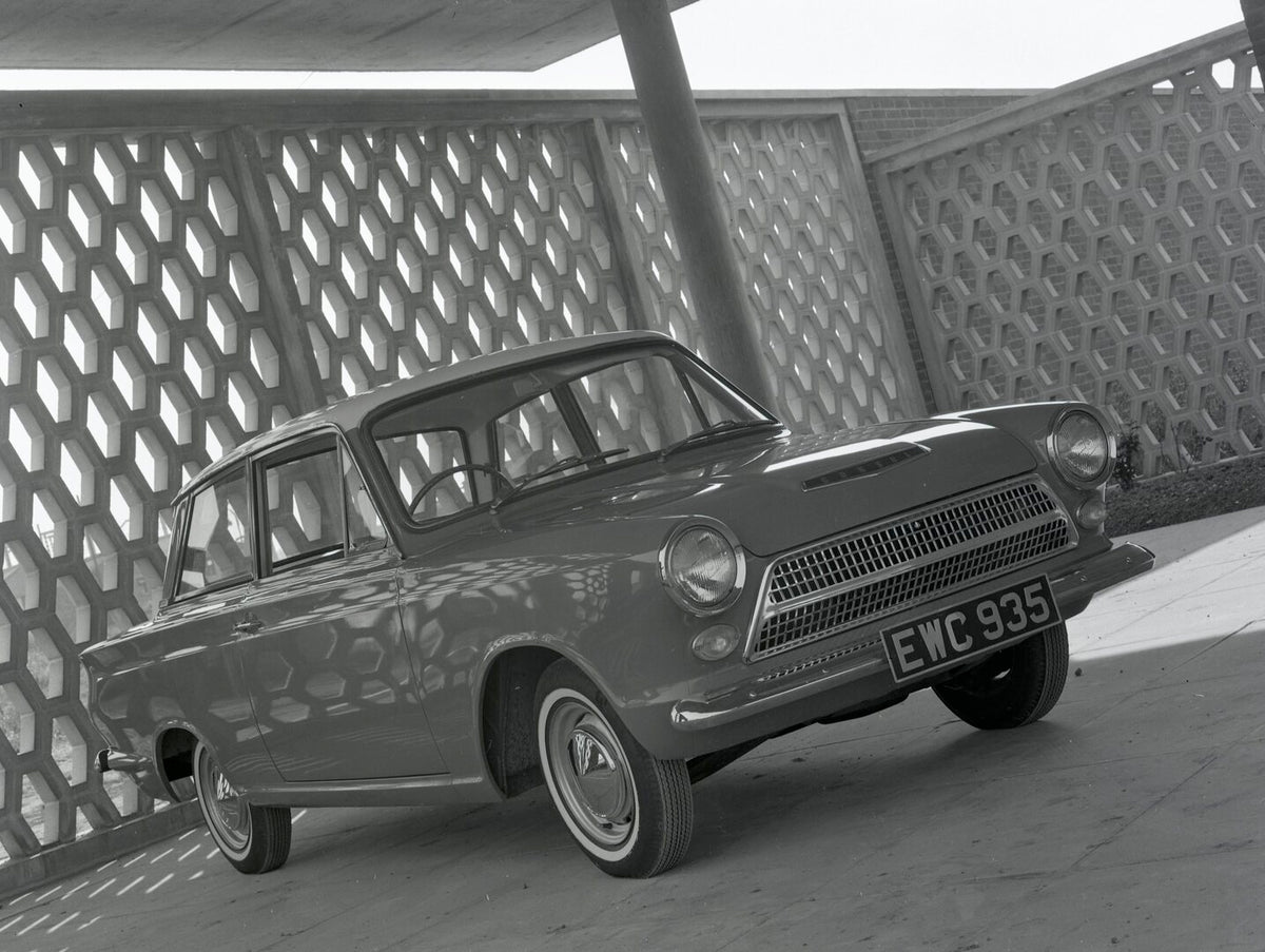 This archival image documents the 1962 Ford Cortina Deluxe Mark I angeled view with scenic wall and is preserved in the Ford Heritage Vault as part of Ford Motor Company's historic photographic archive. Free for personal, non-commercial use. Ford ...