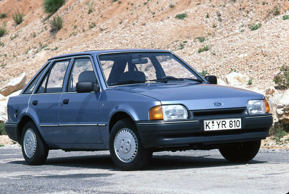 This archival image documents the 1986 Ford Escort Mark IV closeup on scenic road and is preserved in the Ford Heritage Vault as part of Ford Motor Company's historic photographic archive. Free for personal, non-commercial use. Ford Heritage Vault...