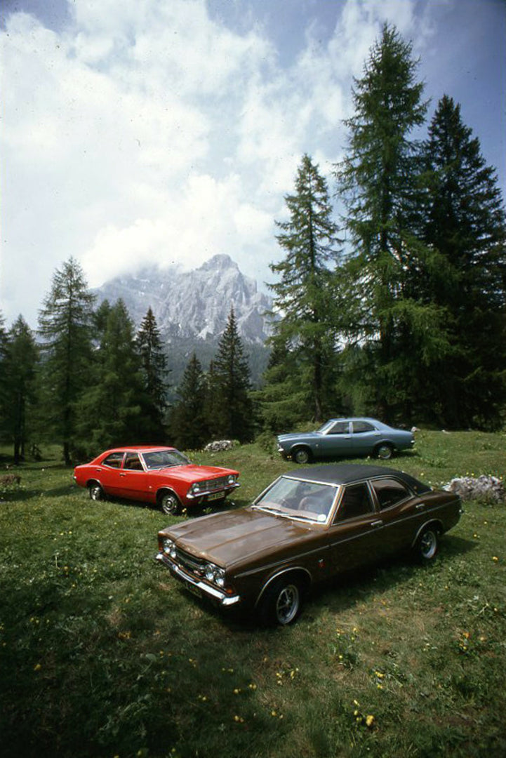 This archival image documents the 1970 Ford Taunus TC range with scenic trees in Italy and is preserved in the Ford Heritage Vault as part of Ford Motor Company's historic photographic archive. Free for personal, non-commercial use. Ford Heritage ...