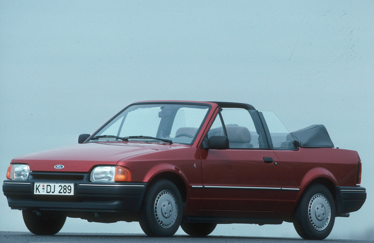 This archival image documents the 1987 Ford Escort Mark IV in studio Escort_Cabrio_Ghia_1987_01 and is preserved in the Ford Heritage Vault as part of Ford Motor Company's historic photographic archive. Free for personal, non-commercial use. Ford ...