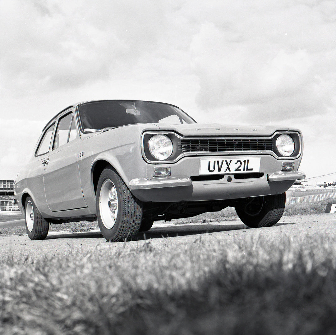 This archival image documents the 1973 Ford Escort Mexico MK1 1600 GT 2 Door near racetrack and is preserved in the Ford Heritage Vault as part of Ford Motor Company's historic photographic archive. Free for personal, non-commercial use. Ford Heri...