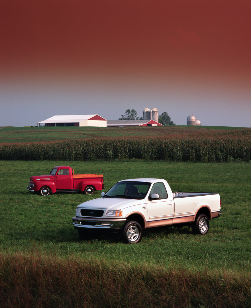 This archival image documents the 1998 Ford F-150 Lariat and 1948 F-1 pickup trucks and is preserved in the Ford Heritage Vault as part of Ford Motor Company's historic photographic archive. Free for personal, non-commercial use. Ford Heritage Vau...