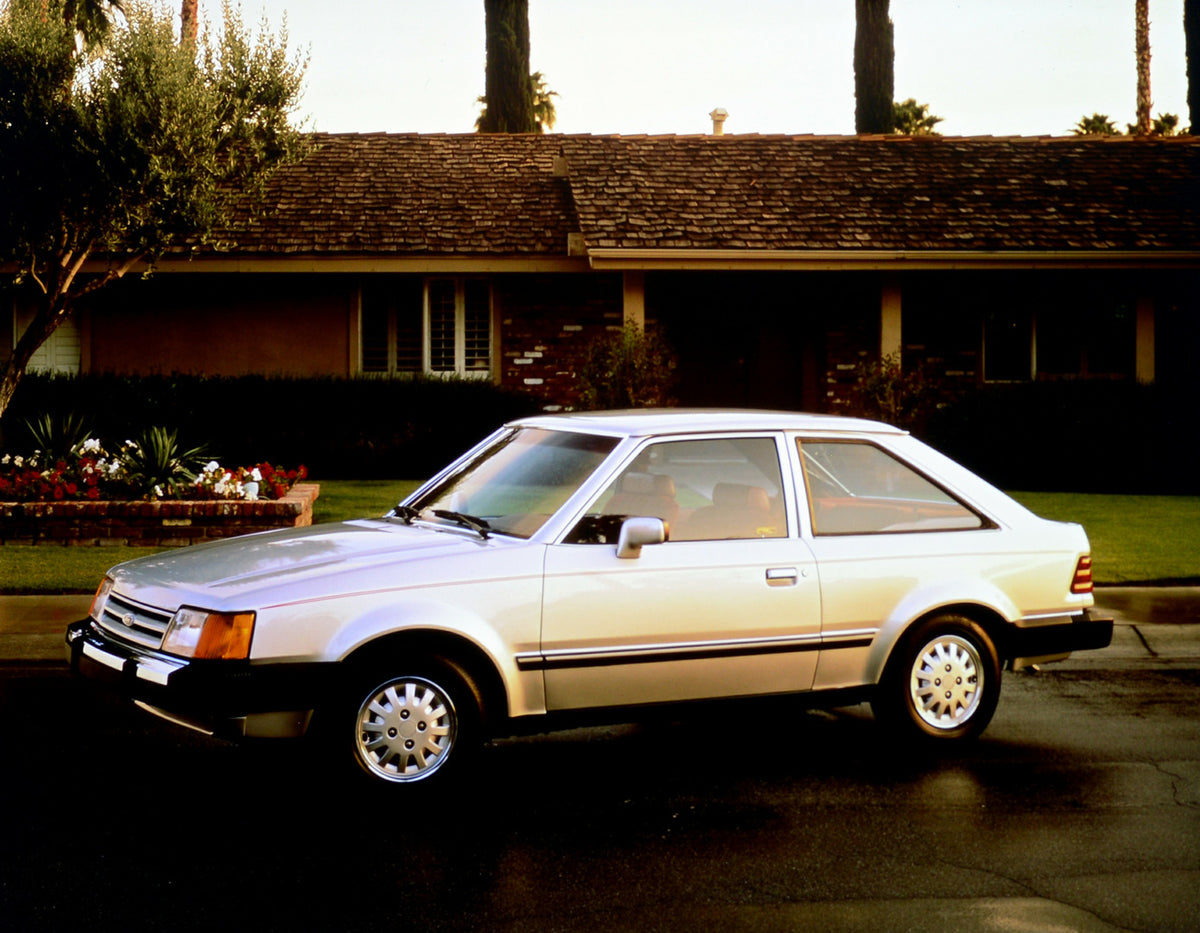 This archival image documents the 1987 Ford Escort two-door and is preserved in the Ford Heritage Vault as part of Ford Motor Company's historic photographic archive. Free for personal, non-commercial use. Ford Heritage Vault reference AR-2001-94-...