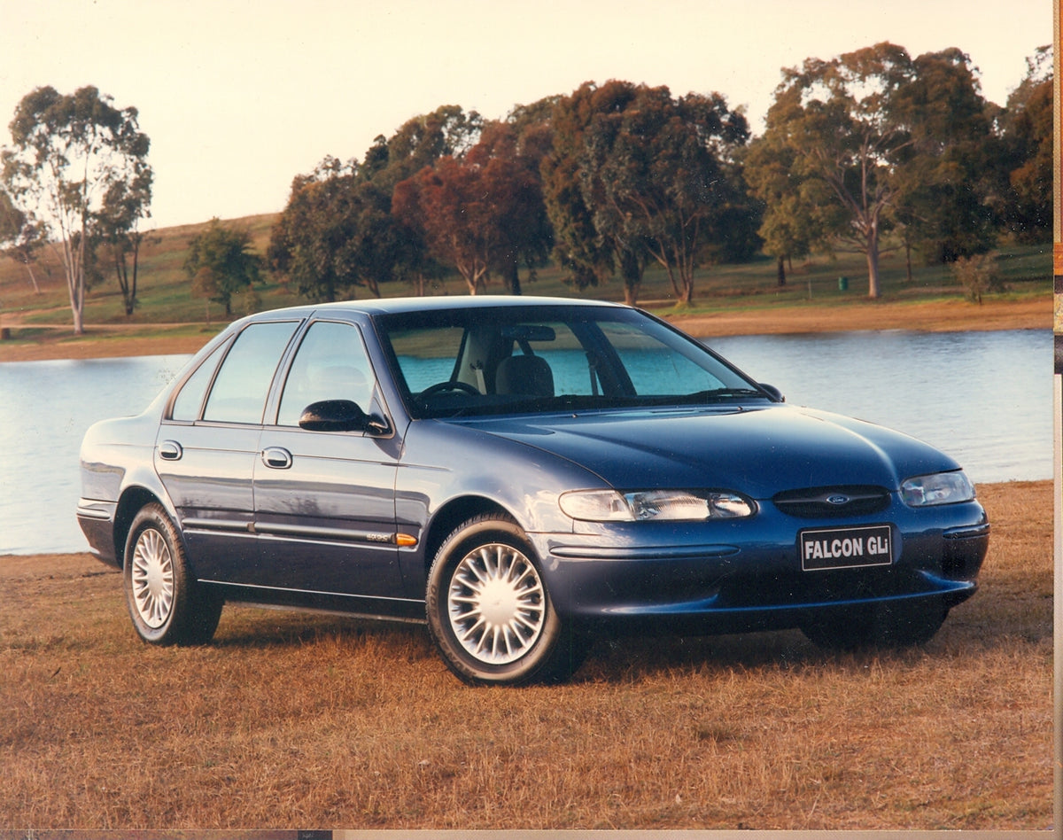 This archival image documents the 1996 Ford EL Falcon GLi near scenic body of water with trees and is preserved in the Ford Heritage Vault as part of Ford Motor Company's historic photographic archive. Free for personal, non-commercial use. Ford H...