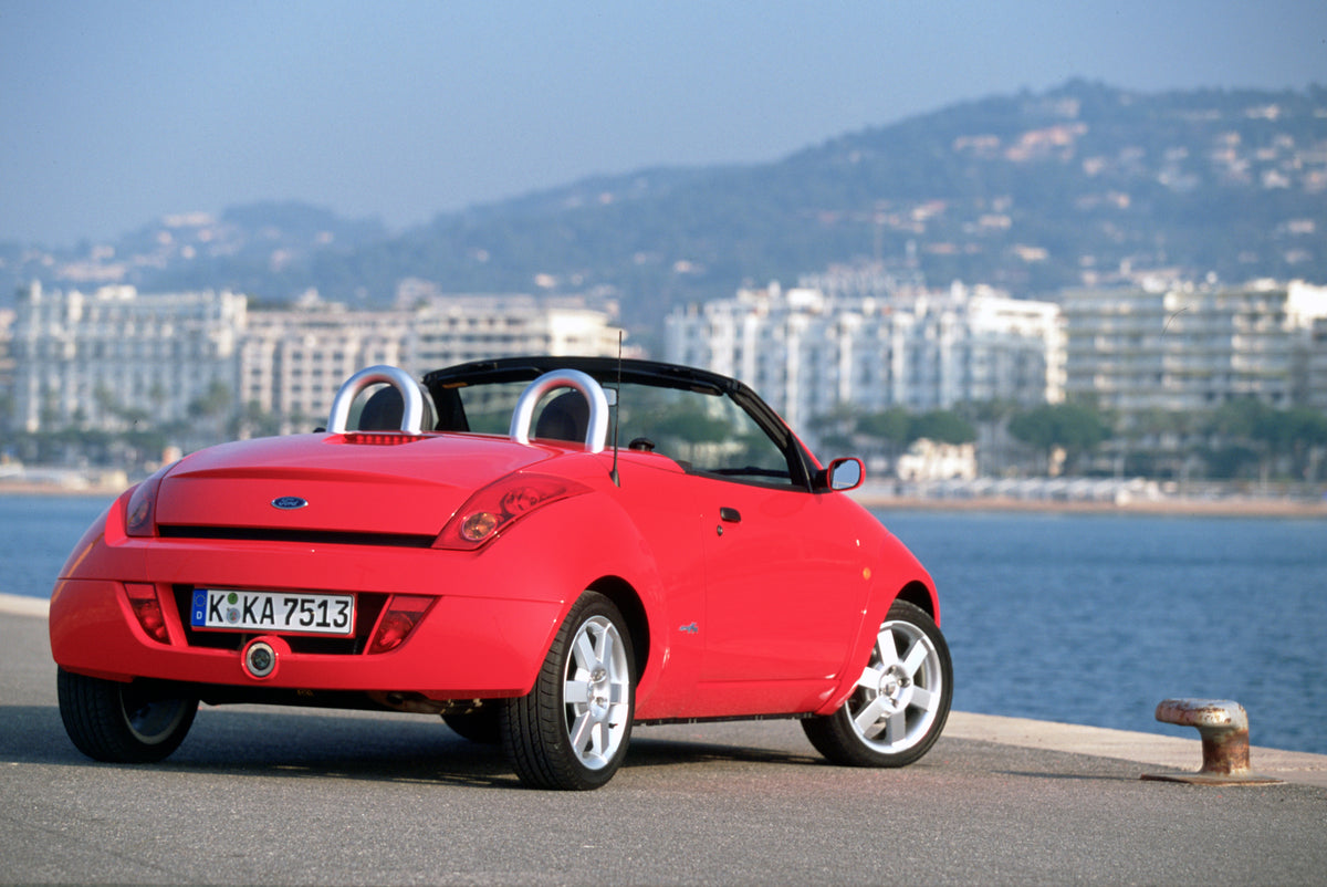 This archival image documents the 2003 Ford Ka Mark I rear view near scenic oceanfront in Cannes and is preserved in the Ford Heritage Vault as part of Ford Motor Company's historic photographic archive. Free for personal, non-commercial use. Ford...