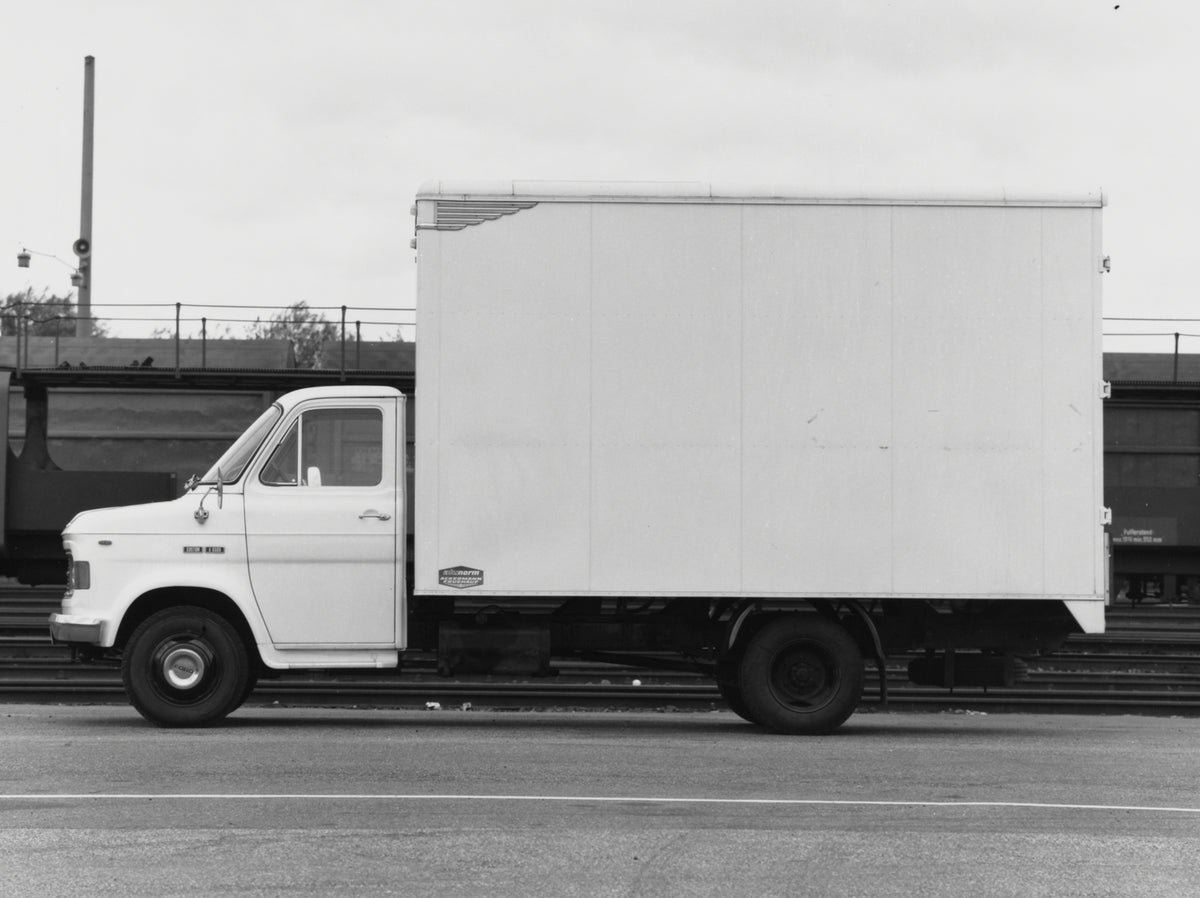 This archival image documents the 1970 Ford A-Series Truck side view on road and is preserved in the Ford Heritage Vault as part of Ford Motor Company's historic photographic archive. Free for personal, non-commercial use. Ford Heritage Vault refe...