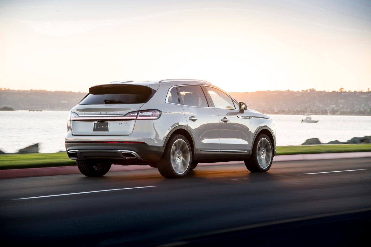 This archival image documents the 2019 Lincoln Nautilus rear view in scenic road and is preserved in the Ford Heritage Vault as part of Ford Motor Company's historic photographic archive. Free for personal, non-commercial use. Ford Heritage Vault ...