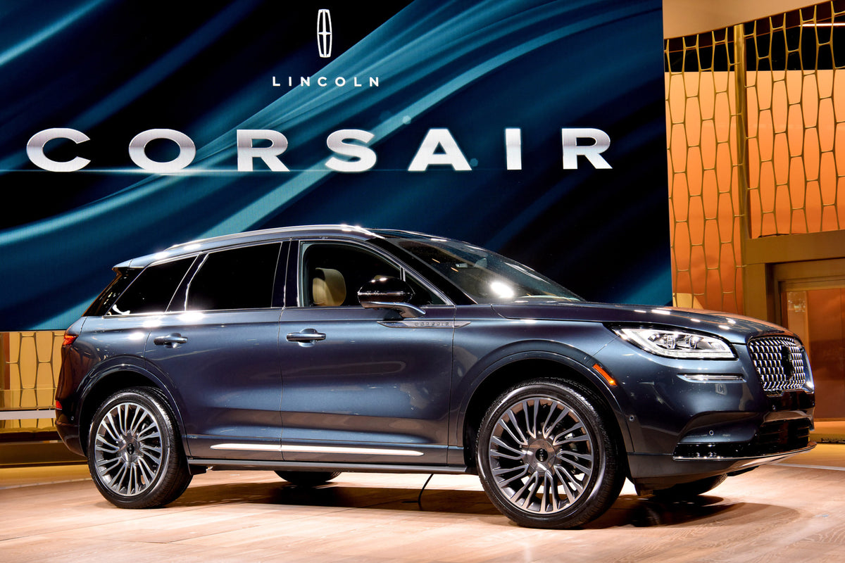 This archival image documents the 2019 Lincoln Corsair with sign and is preserved in the Ford Heritage Vault as part of Ford Motor Company's historic photographic archive. Free for personal, non-commercial use. Ford Heritage Vault reference AR-200...
