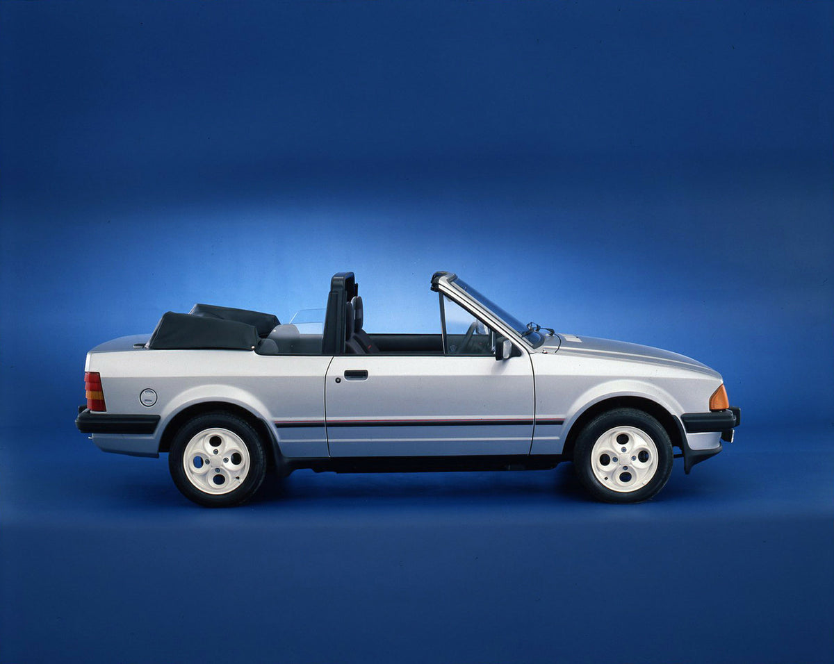 This archival image documents the 1983 Ford Escort Cabriolet Mark III LHD in studio and is preserved in the Ford Heritage Vault as part of Ford Motor Company's historic photographic archive. Free for personal, non-commercial use. Ford Heritage Vau...