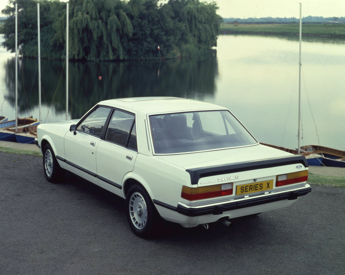 This archival image documents the 1981 Ford Granada GLS Series X rear view with scenic lake and boats and is preserved in the Ford Heritage Vault as part of Ford Motor Company's historic photographic archive. Free for personal, non-commercial use....