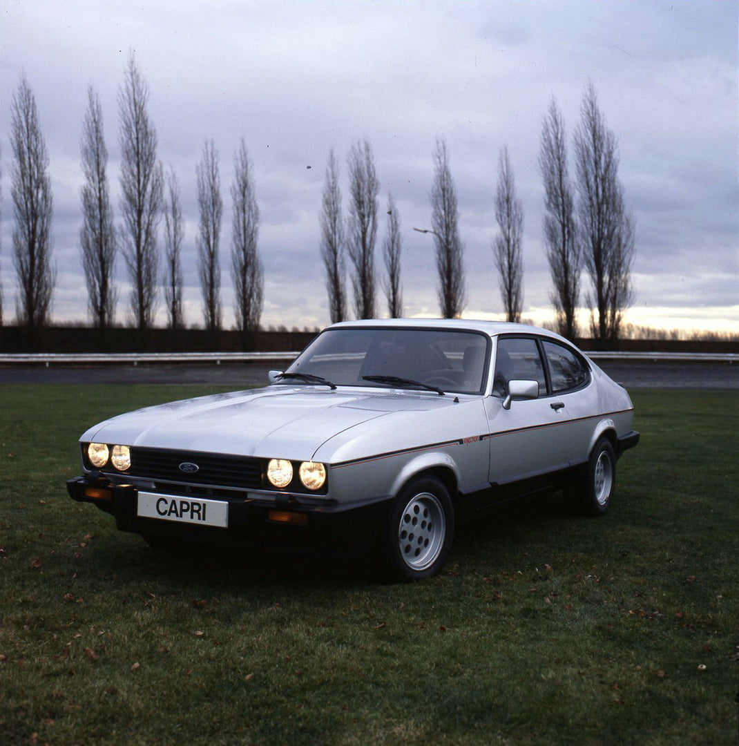 This archival image documents the 1982 Ford Capri 2.8i LHD Mark III scenic and is preserved in the Ford Heritage Vault as part of Ford Motor Company's historic photographic archive. Free for personal, non-commercial use. Ford Heritage Vault refere...