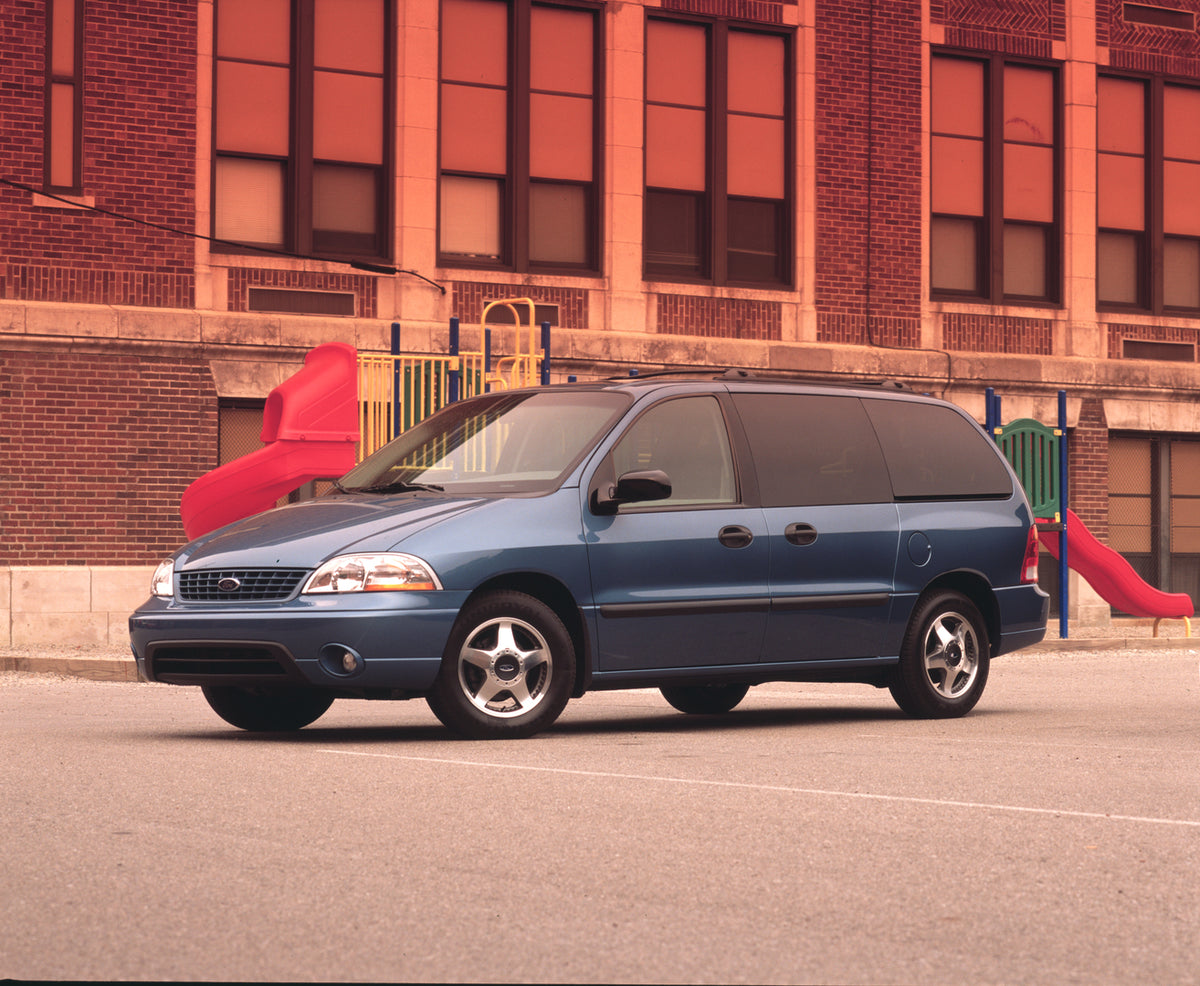 This archival image documents the 2002 Ford Windstar LX in front of playscape and is preserved in the Ford Heritage Vault as part of Ford Motor Company's historic photographic archive. Free for personal, non-commercial use. Ford Heritage Vault ref...
