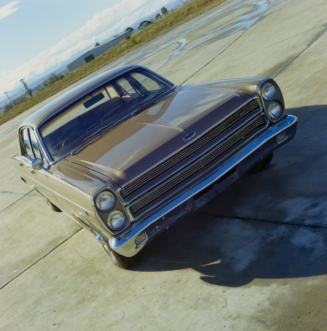This archival image documents the 1969 Ford ZC Fairlane Sedan Front End View in Empty Lot FAP-2011-3 and is preserved in the Ford Heritage Vault as part of Ford Motor Company's historic photographic archive. Free for personal, non-commercial use. ...