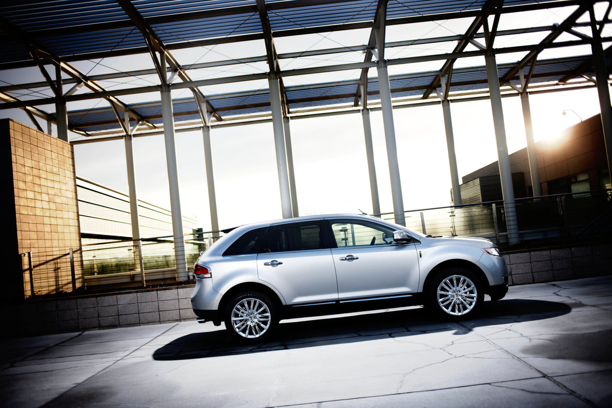 This archival image documents the 2012 Lincoln MKX side view with building MS6750 and is preserved in the Ford Heritage Vault as part of Ford Motor Company's historic photographic archive. Free for personal, non-commercial use. Ford Heritage Vault...