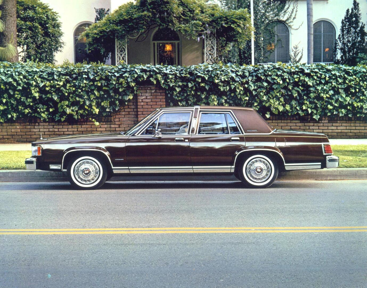 This archival image documents the 1984 Mercury Grand Marquis driver-side in front of building AR-97-213544-44-1 and is preserved in the Ford Heritage Vault as part of Ford Motor Company's historic photographic archive. Free for personal, non-comme...