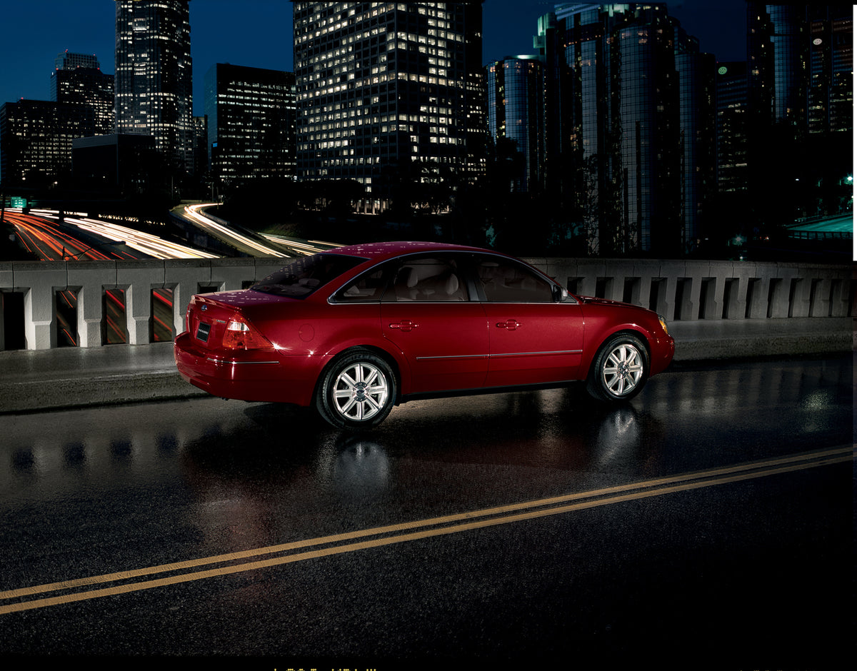 This archival image documents the 2006 Ford Five Hundred with city skyline at night and is preserved in the Ford Heritage Vault as part of Ford Motor Company's historic photographic archive. Free for personal, non-commercial use. Ford Heritage Vau...
