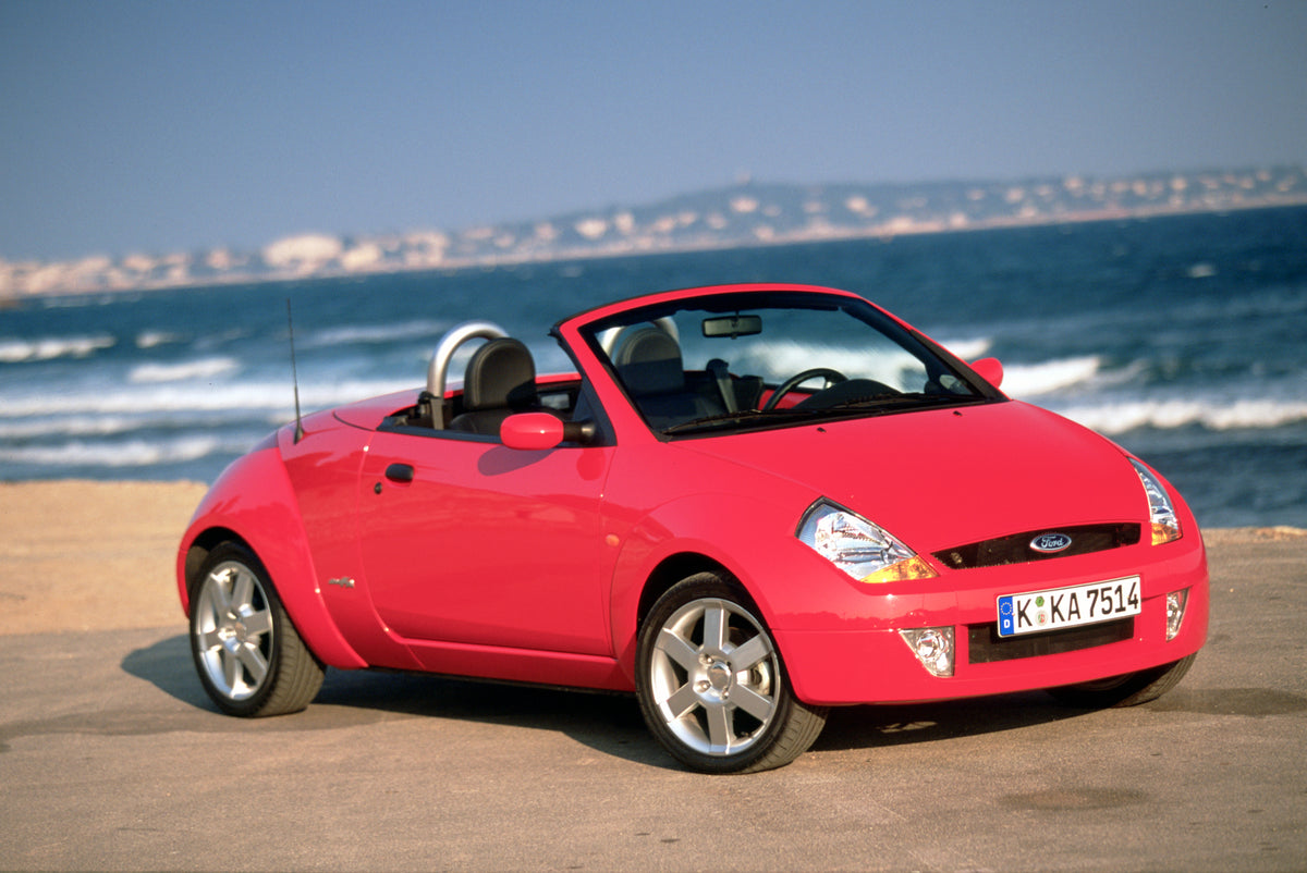 This archival image documents the 2003 Ford Ka Mark I on scenic beach in Cannes and is preserved in the Ford Heritage Vault as part of Ford Motor Company's historic photographic archive. Free for personal, non-commercial use. Ford Heritage Vault r...