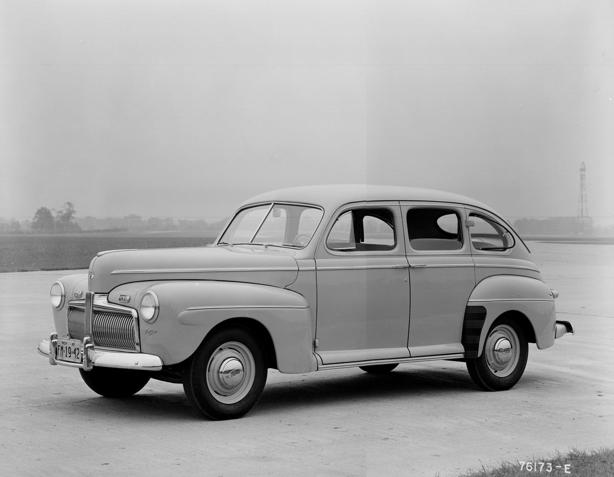 This archival image documents the 1942 Ford Super Deluxe fordor sedan and is preserved in the Ford Heritage Vault as part of Ford Motor Company's historic photographic archive. Free for personal, non-commercial use. Ford Heritage Vault reference A...