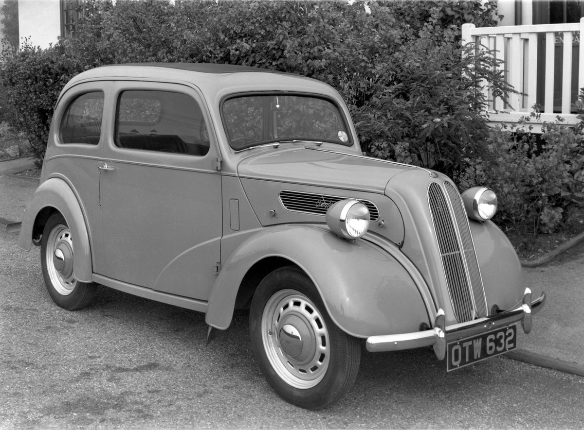 This archival image documents the 1949 Ford Anglia in Sports Club Drive and is preserved in the Ford Heritage Vault as part of Ford Motor Company's historic photographic archive. Free for personal, non-commercial use. Ford Heritage Vault reference...