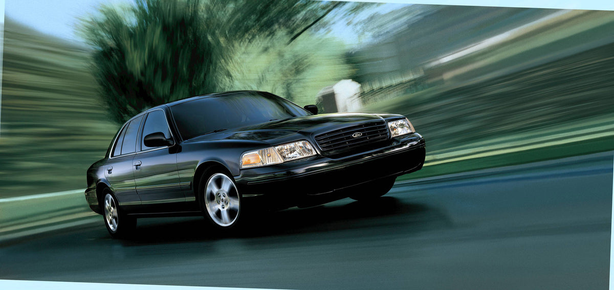 This archival image documents the 2004 Ford Crown Victoria and is preserved in the Ford Heritage Vault as part of Ford Motor Company's historic photographic archive. Free for personal, non-commercial use. Ford Heritage Vault reference AR-2008-8.1....