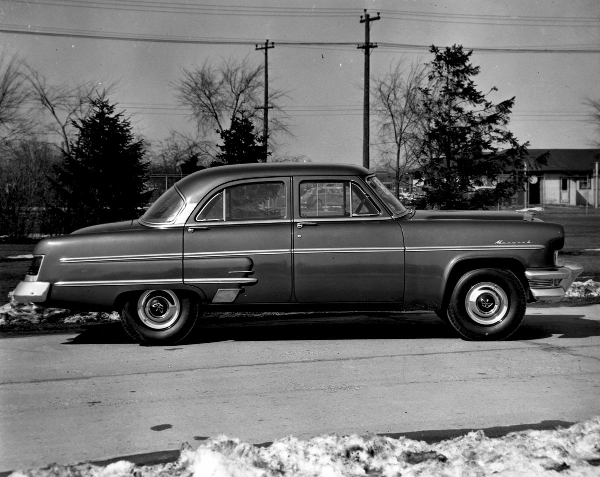 This archival image documents the 1954 Monarch Sedan side view on scenic road with trees AR-2007-5 and is preserved in the Ford Heritage Vault as part of Ford Motor Company's historic photographic archive. Free for personal, non-commercial use. Fo...