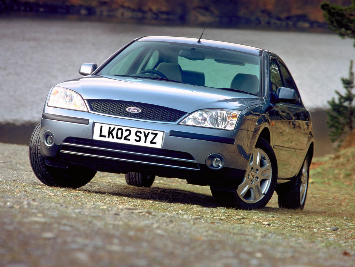 This archival image documents the 2002 Ford Mondeo Mark II front view with scenic lake and is preserved in the Ford Heritage Vault as part of Ford Motor Company's historic photographic archive. Free for personal, non-commercial use. Ford Heritage ...