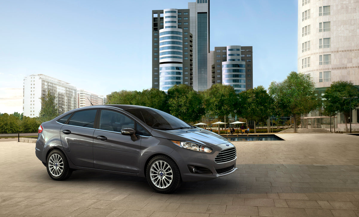 This archival image documents the 2015 Ford Fiesta in city with trees and is preserved in the Ford Heritage Vault as part of Ford Motor Company's historic photographic archive. Free for personal, non-commercial use. Ford Heritage Vault reference A...