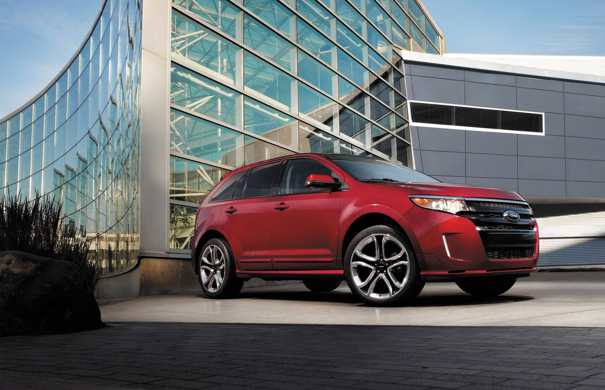 This archival image documents the 2014 Ford Edge Sport in front of glass building and is preserved in the Ford Heritage Vault as part of Ford Motor Company's historic photographic archive. Free for personal, non-commercial use. Ford Heritage Vault...