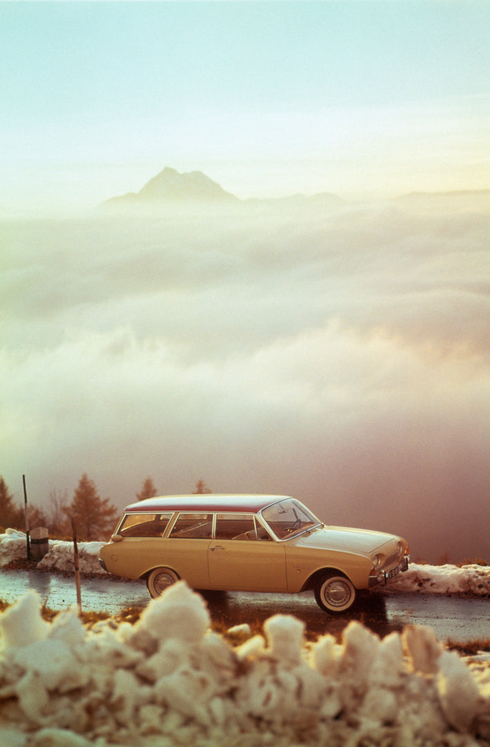 This archival image documents the 1960 Ford Taunus 17M P3 aerial view on scenic road with misty mountains and is preserved in the Ford Heritage Vault as part of Ford Motor Company's historic photographic archive. Free for personal, non-commercial ...