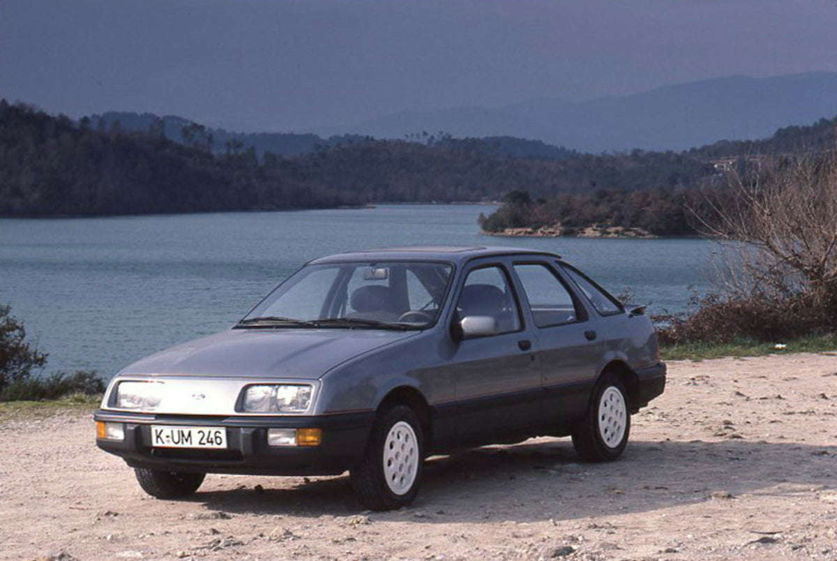 This archival image documents the 1985 Ford Sierra 2.0 IS LHD on scenic beach and is preserved in the Ford Heritage Vault as part of Ford Motor Company's historic photographic archive. Free for personal, non-commercial use. Ford Heritage Vault ref...