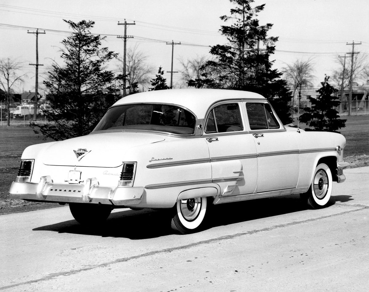 This archival image documents the 1954 Monarch Lucerne Sedan rear view on scenic road with trees AR-2007-5 and is preserved in the Ford Heritage Vault as part of Ford Motor Company's historic photographic archive. Free for personal, non-commercial...