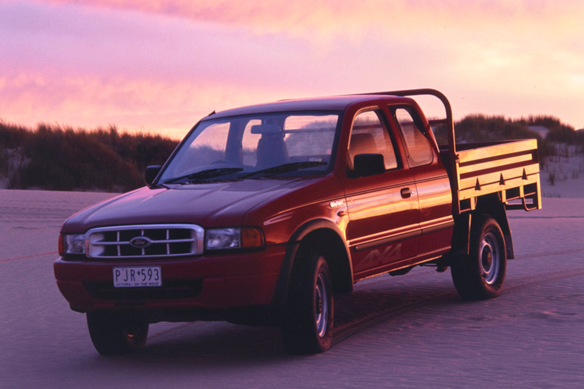 This archival image documents the 1999 Ford Courier 4WD Pickup Truck Passenger Side Front End View on the Beach FAP-2011-3 and is preserved in the Ford Heritage Vault as part of Ford Motor Company's historic photographic archive. Free for personal...