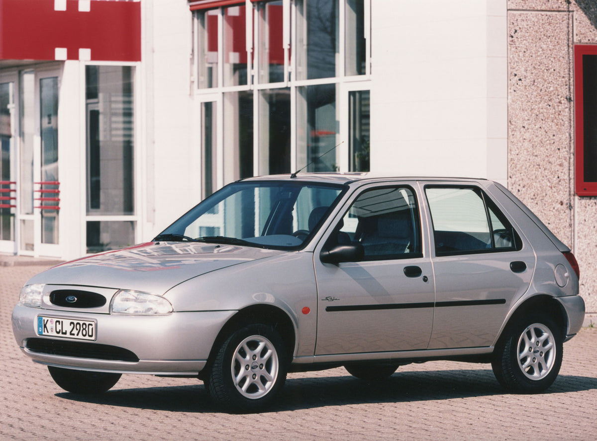 This archival image documents the 1997 Ford Fiesta Mark IV in front of building and is preserved in the Ford Heritage Vault as part of Ford Motor Company's historic photographic archive. Free for personal, non-commercial use. Ford Heritage Vault r...
