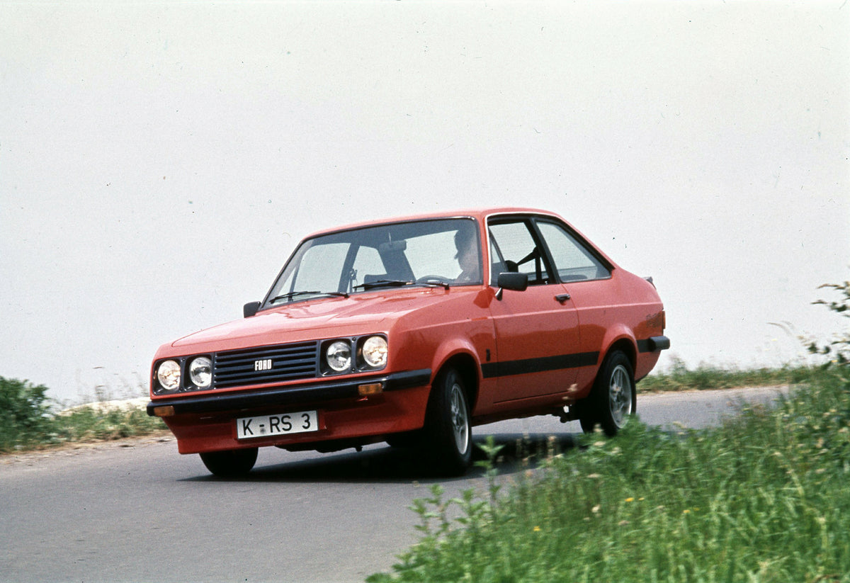 This archival image documents the 1975 Ford Escort Mark II RS 2000 action shot on scenic road and is preserved in the Ford Heritage Vault as part of Ford Motor Company's historic photographic archive. Free for personal, non-commercial use. Ford He...