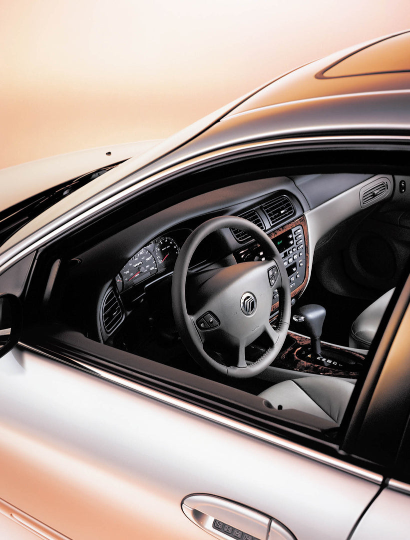 This archival image documents the 2003 Mercury Sable side closeup with view of interior MS32026 and is preserved in the Ford Heritage Vault as part of Ford Motor Company's historic photographic archive. Free for personal, non-commercial use. Ford ...