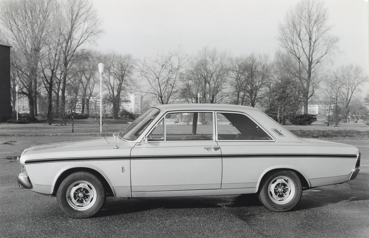 This archival image documents the 1968 Ford Taunus 17M P7 RS side view with scenic trees and is preserved in the Ford Heritage Vault as part of Ford Motor Company's historic photographic archive. Free for personal, non-commercial use. Ford Heritag...