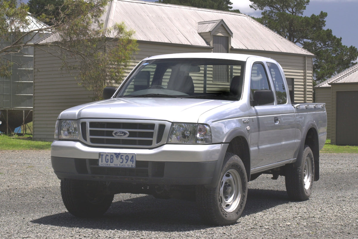 This archival image documents the 2005 Ford PH Courier V6 XLT Pickup Truck Passenger Side Front End View in Driveway FAP-2011-3 and is preserved in the Ford Heritage Vault as part of Ford Motor Company's historic photographic archive. Free for per...