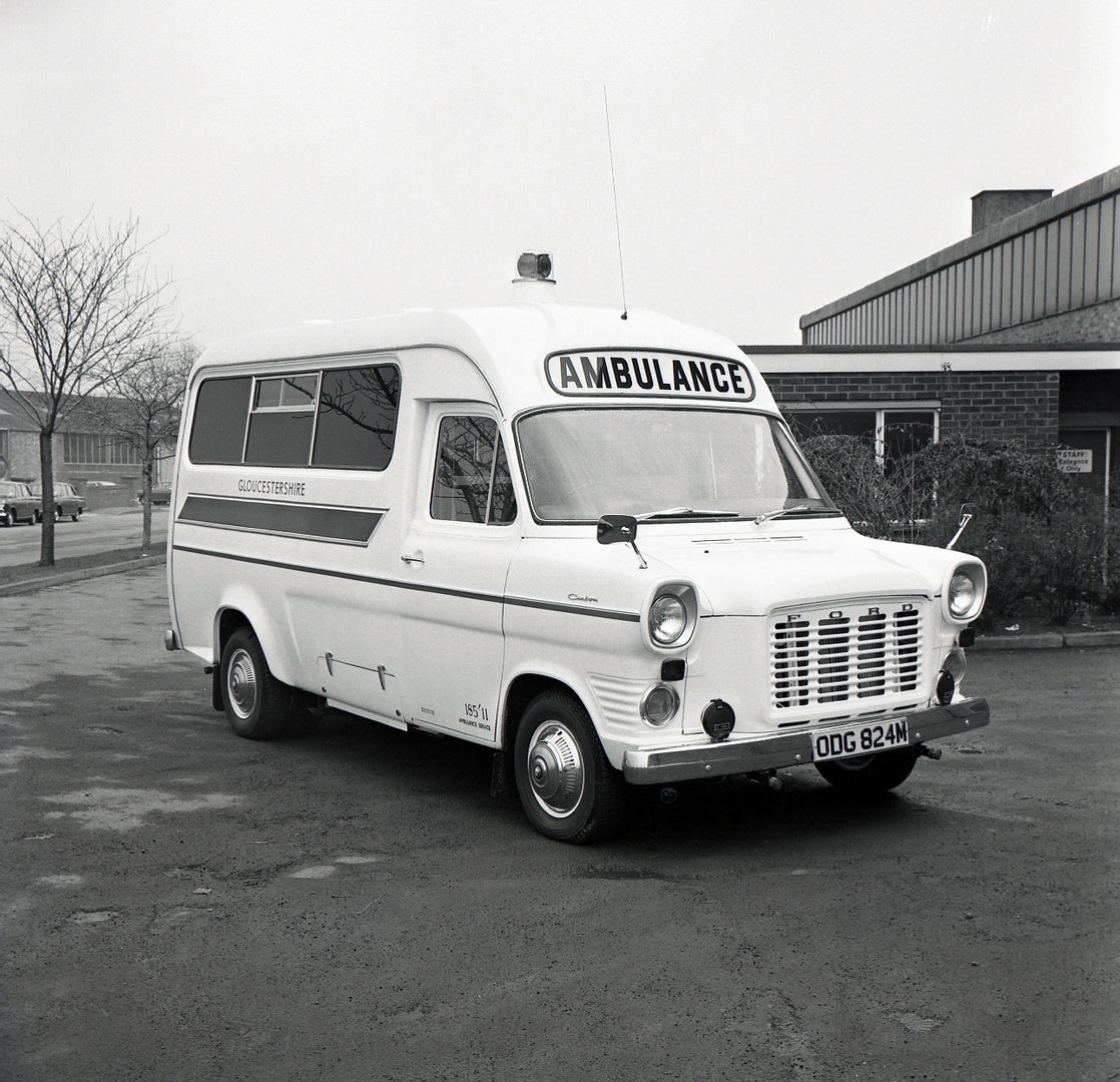 This archival image documents the 1974 Ford Transit Mark I Gloucestershire Ambulance and is preserved in the Ford Heritage Vault as part of Ford Motor Company's historic photographic archive. Free for personal, non-commercial use. Ford Heritage Va...