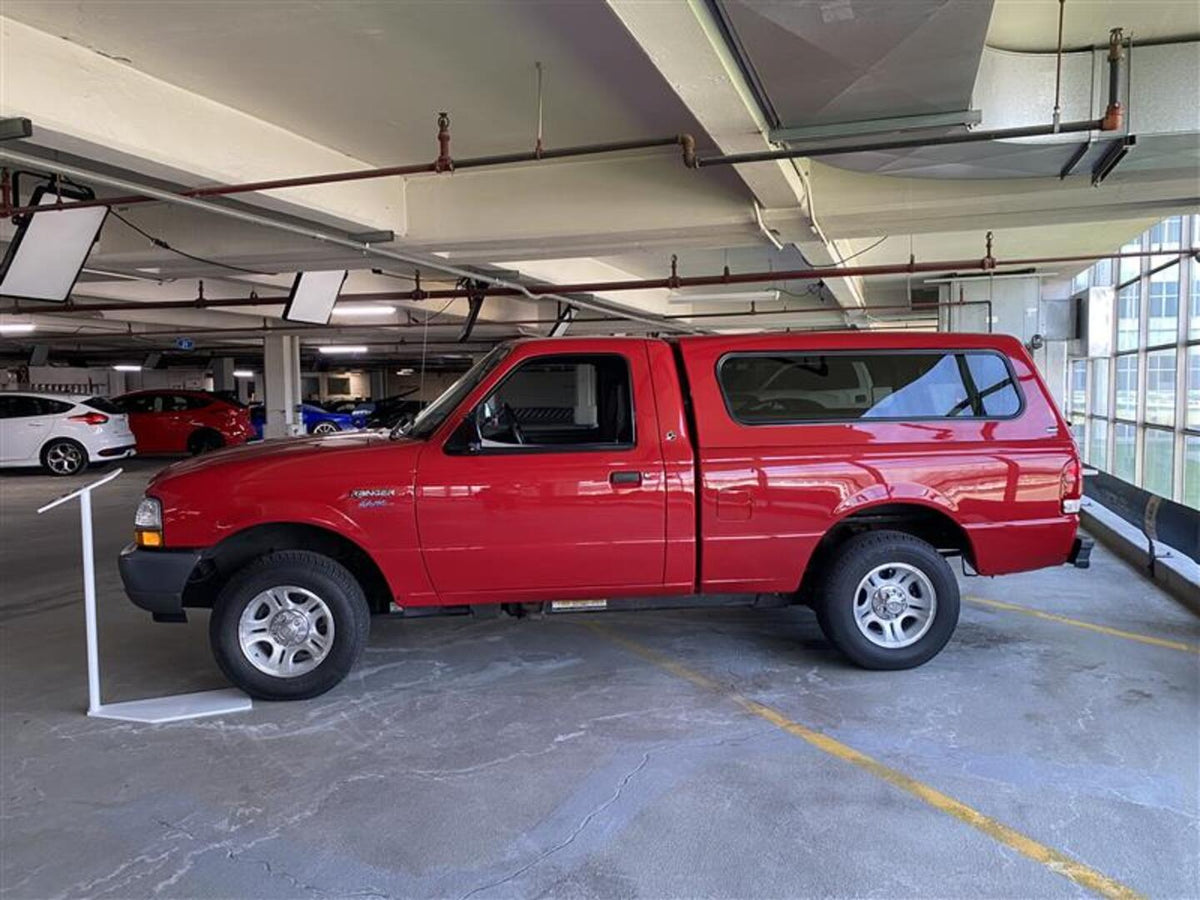 This archival image documents the 2000 Ford Ranger EV Pickup Truck and is preserved in the Ford Heritage Vault as part of Ford Motor Company's historic photographic archive. Free for personal, non-commercial use. Ford Heritage Vault reference AR-2...