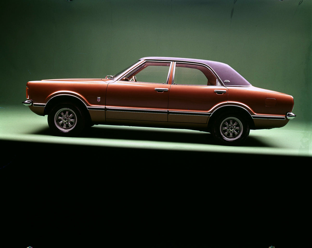 This archival image documents the 1973 Ford Taunus GXL side view in studio and is preserved in the Ford Heritage Vault as part of Ford Motor Company's historic photographic archive. Free for personal, non-commercial use. Ford Heritage Vault refere...