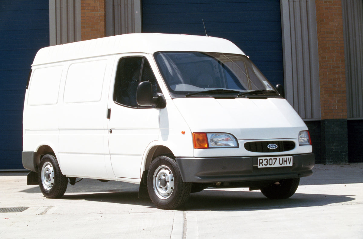 This archival image documents the 1996 Ford Transit Van Mark III Short Wheelbase in front of building and is preserved in the Ford Heritage Vault as part of Ford Motor Company's historic photographic archive. Free for personal, non-commercial use....