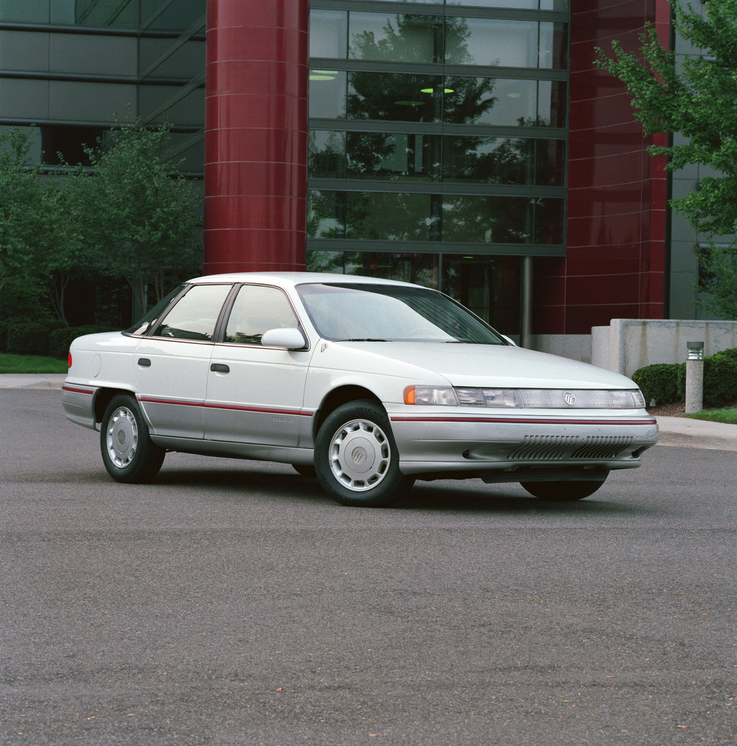 This archival image documents the 1992 Mercury Sable LS Side Angle and is preserved in the Ford Heritage Vault as part of Ford Motor Company's historic photographic archive. Free for personal, non-commercial use. Ford Heritage Vault reference AR-2...