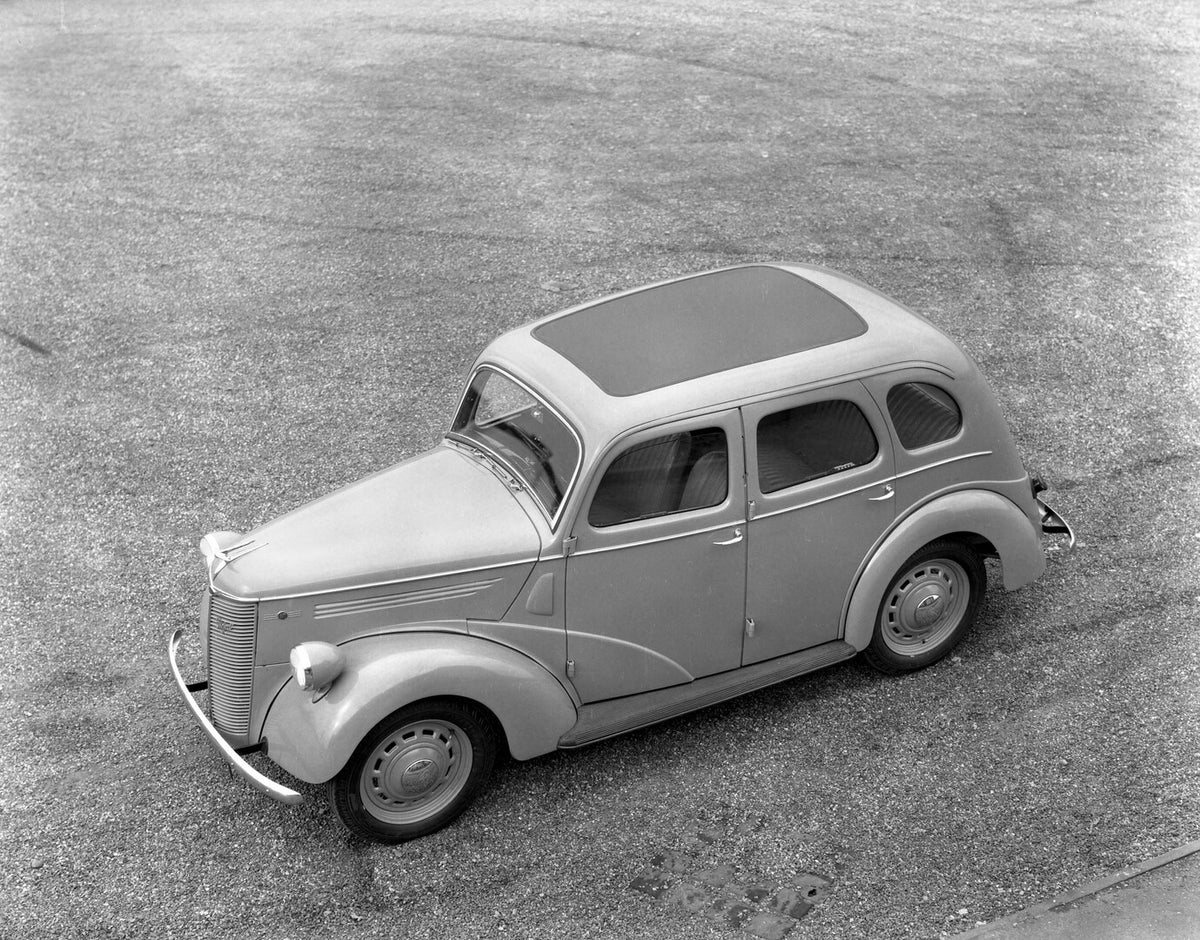 This archival image documents the 1938 Ford Prefect 10 HP aerial view in scenic field 2E 131 and is preserved in the Ford Heritage Vault as part of Ford Motor Company's historic photographic archive. Free for personal, non-commercial use. Ford Her...